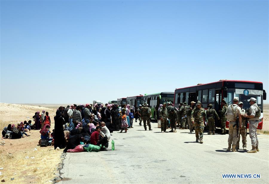 SYRIA-HOMS-REFUGEE-RETURN