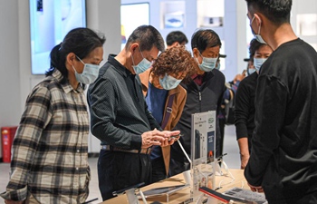 People visit duty-free shopping mall in Haikou during Lunar New Year holiday